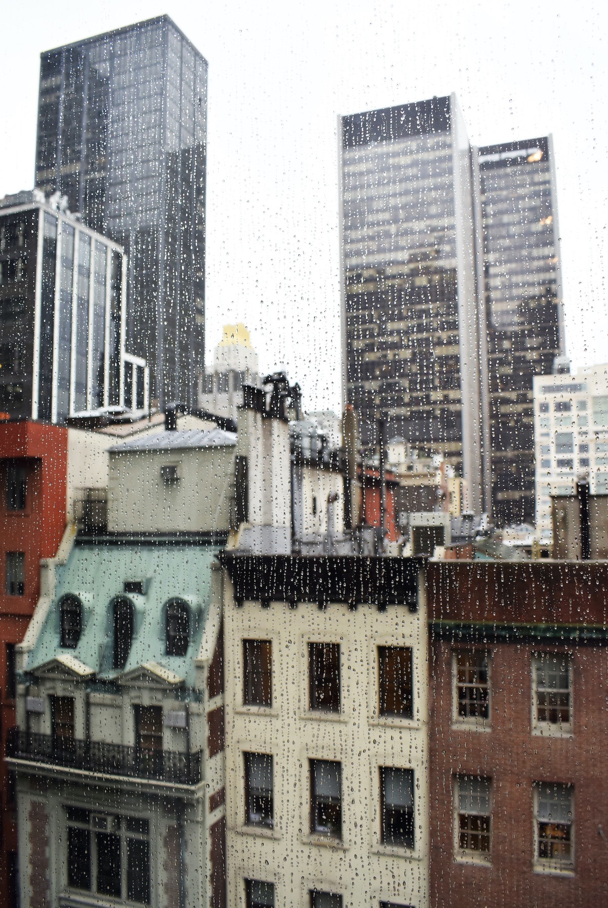 Photo of the city through a rainy window