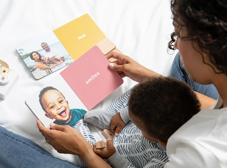 Mother reading Baby Board Book with her little one